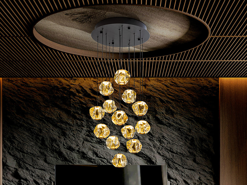 Schuller Zaria 13-light chandelier, black/bronze/amber, D60, dim, 502344