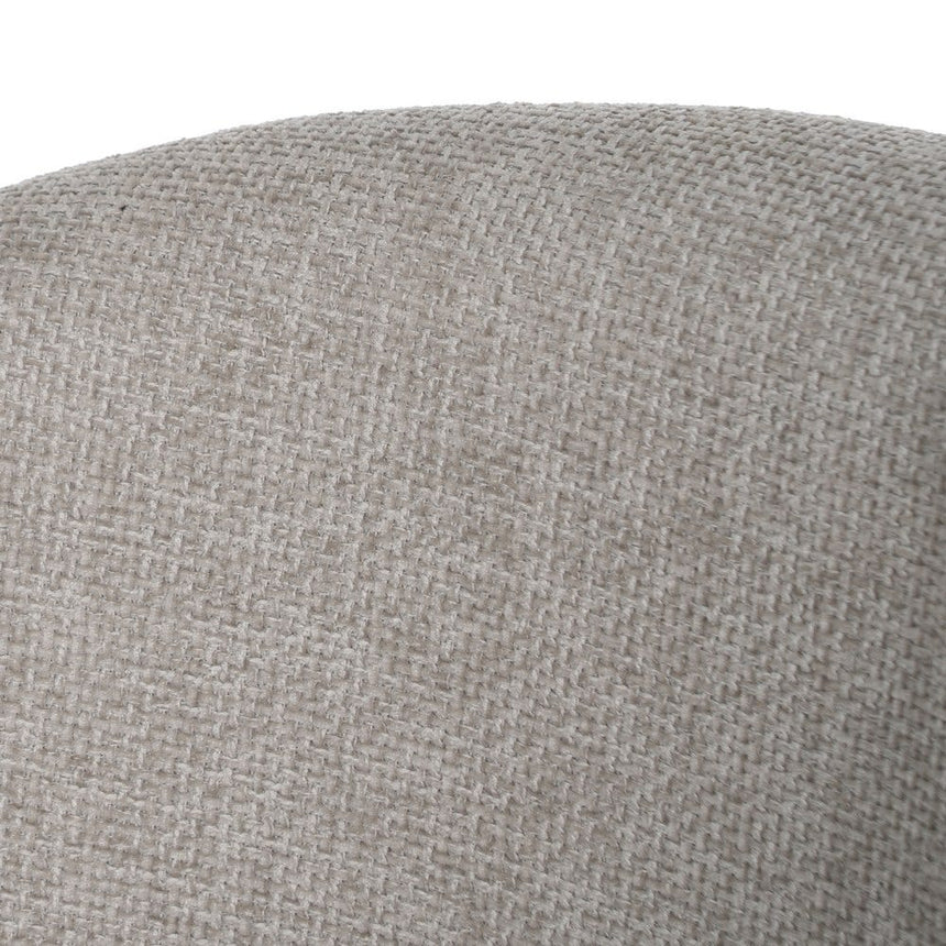 Silla IXIA 612599 tapizada gris con patas negras, detalle del tejido en el respaldo