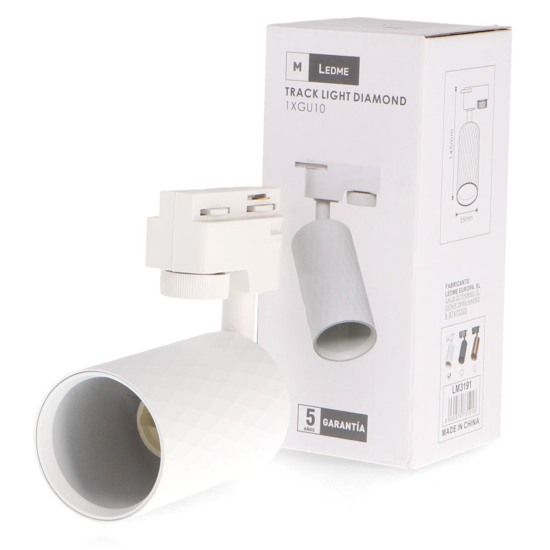 Foco de carril LEDME LM3191 Diamond blanco junto a su embalaje de LEDME