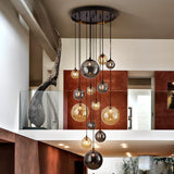 Schuller Dark Lámpara grande 5m altura 14 luces negro latón 439015G