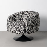 Sillón giratorio IXIA 616830 negro y blanco, vista completa en interior neutro