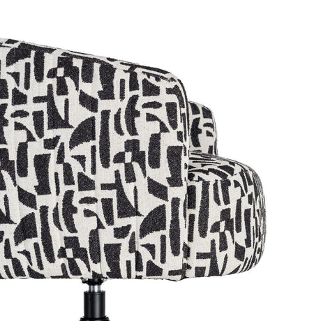 Sillón giratorio IXIA 616830 negro y blanco, detalle lateral del asiento y unión con la base