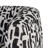 Sillón giratorio IXIA 616830 negro y blanco, detalle del tapizado superior del brazo