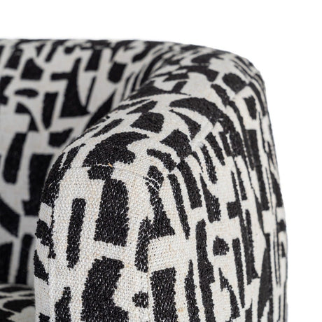 Sillón giratorio IXIA 616830 negro y blanco, detalle del tapizado superior del brazo