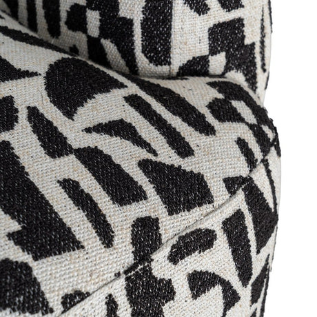 Sillón giratorio IXIA 616830 negro y blanco, detalle de la unión del asiento y el respaldo