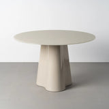 Mesa de comedor IXIA 617097 crema con tablero redondo y base central, vista en ambiente