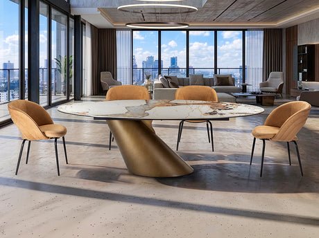 Mesa Schuller Zima 240 con base bronce patinado y tablero Pandora; ambiente con sillas y lámpara no incluidas