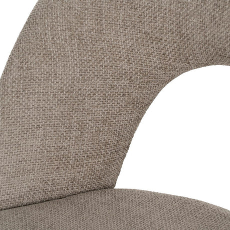 Silla IXIA 612565 tapizada taupe con respaldo abierto y patas de hierro negro, detalle de la abertura del respaldo