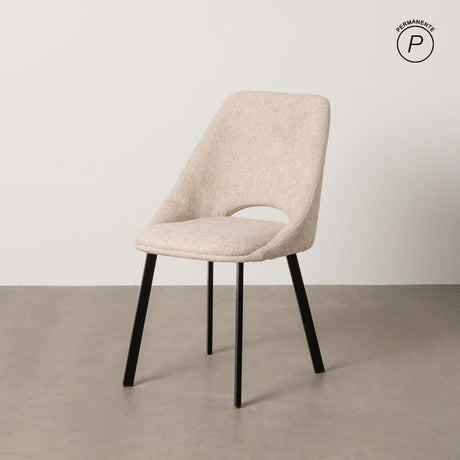 Silla IXIA 612644 tapizada crema con estructura metálica oscura, ambiente con pared y suelo