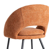 Silla IXIA 615396 tapizada calabaza con patas de hierro negro, detalle del respaldo