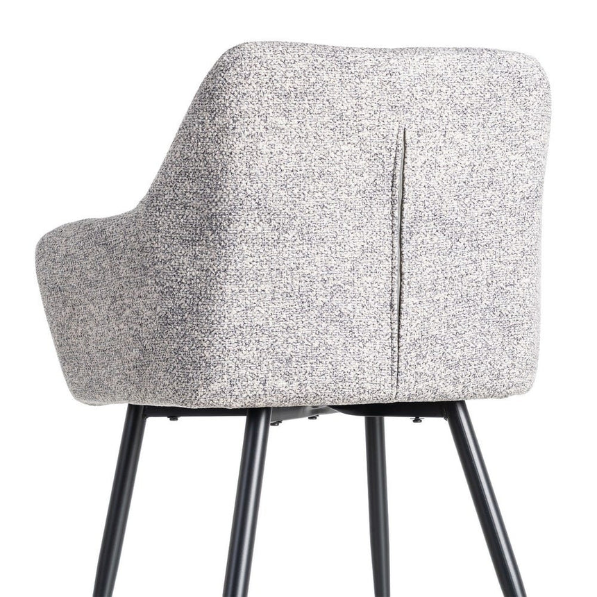 Silla IXIA 615419 tapizada jaspeado gris y blanco con brazos y patas negras, detalle posterior del respaldo