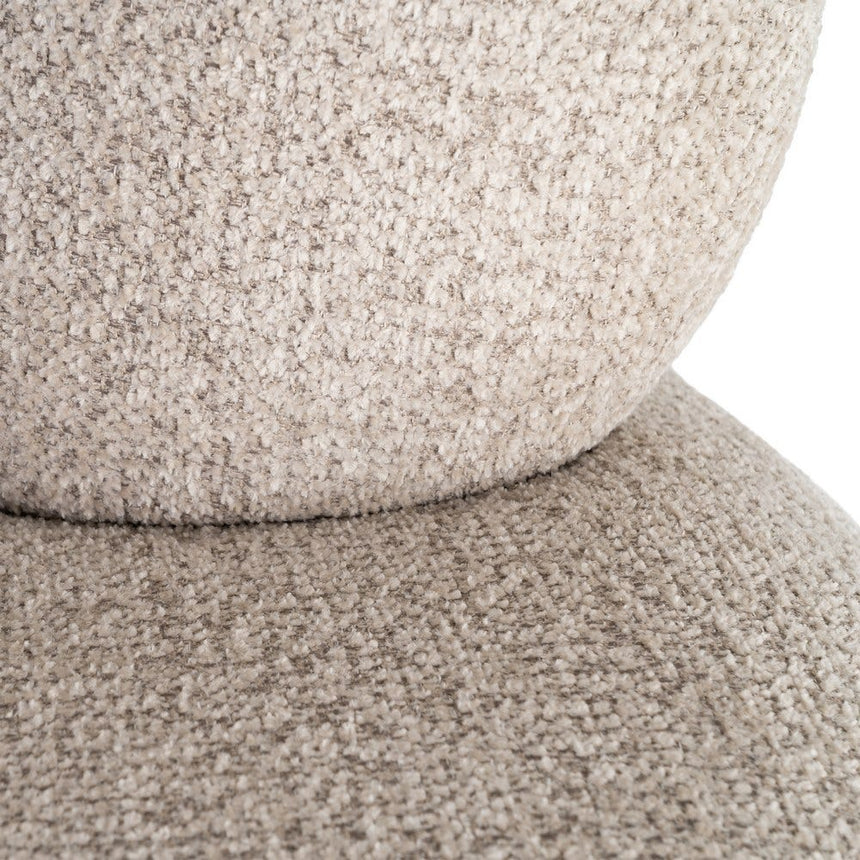 Detalle del tejido beige entre asiento y respaldo de IXIA 616940