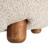 Detalle de una pata y el tapizado beige de IXIA 616940