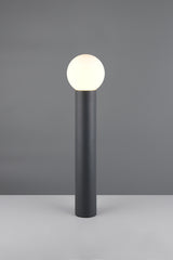 Baliza Mures 469860142 de 80 cm en antracita y vidrio blanco, encendida sobre una superficie clara