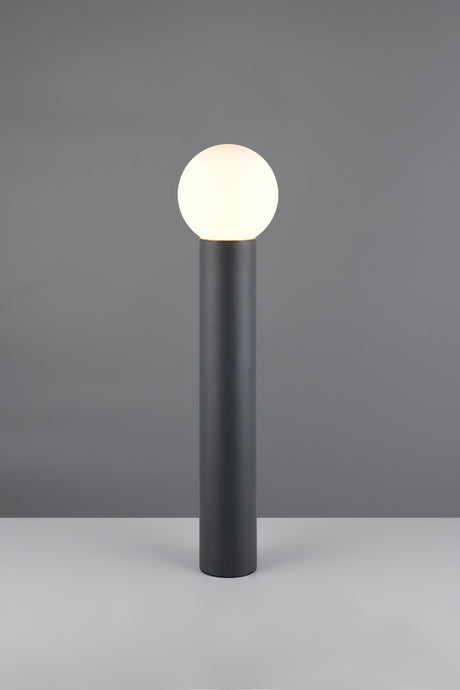 Baliza Mures 469860142 de 80 cm en antracita y vidrio blanco, encendida sobre una superficie clara